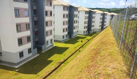 Fachada moderna de prédio comercial ou condomínio residencial em Belo Horizonte (BH), representando a área de atuação da Conservadora Legionários.